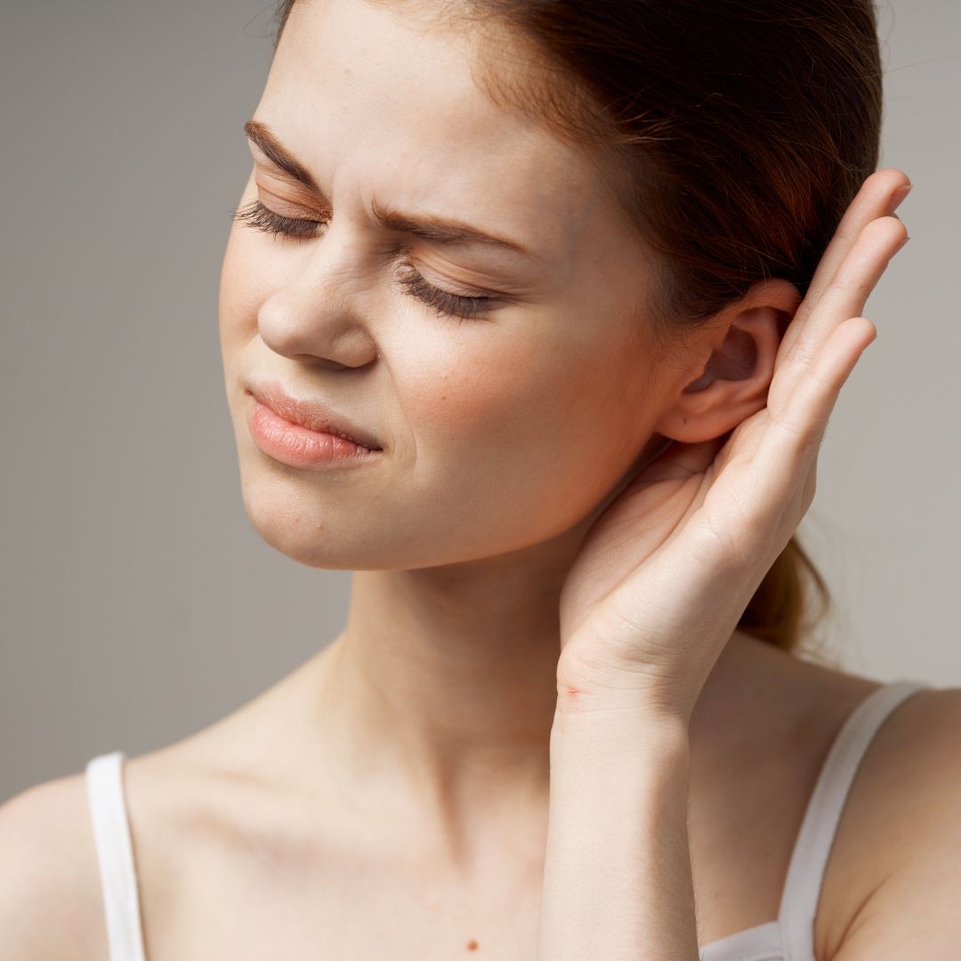 person with ear pain
